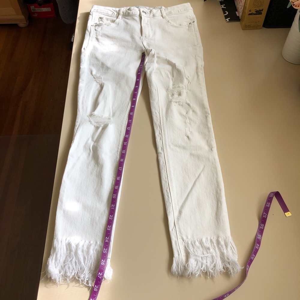 zara trafaluc denimwear | white distressed skinny frayed ankle jeans